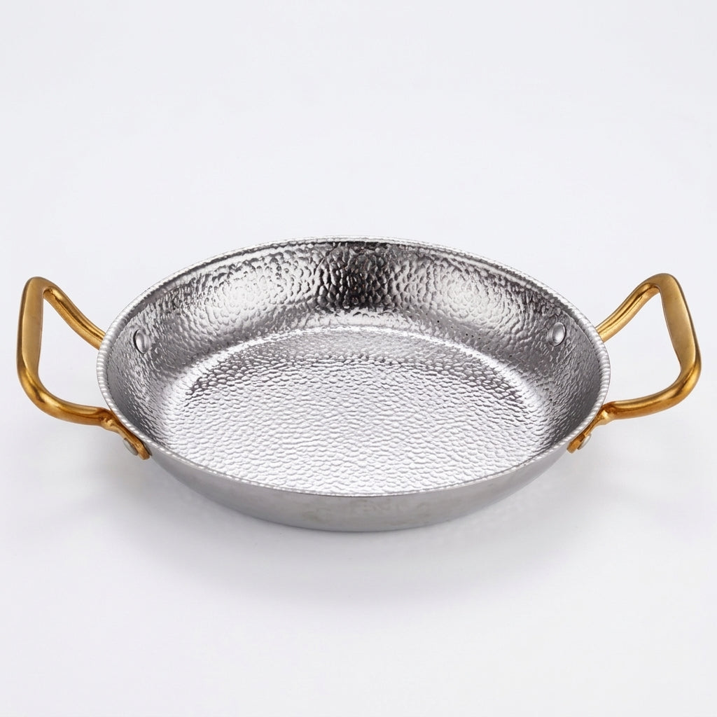 Poêle inox martelée à 2 anses dorées