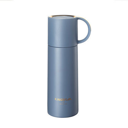 Bouteille isotherme inox bleue, fond blanc