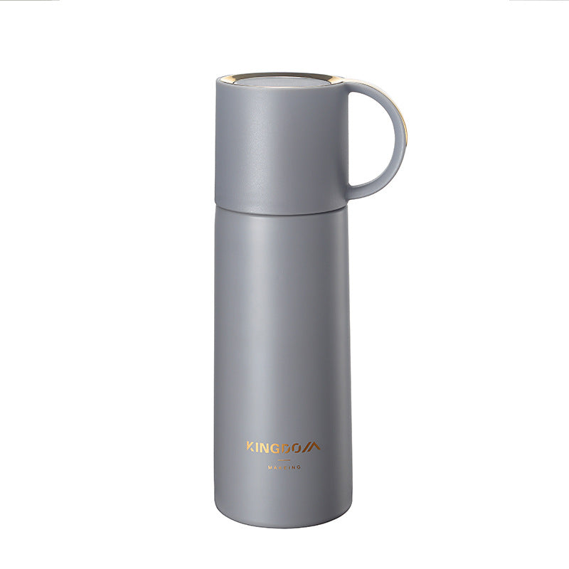 Bouteille isotherme inox grise, fond blanc